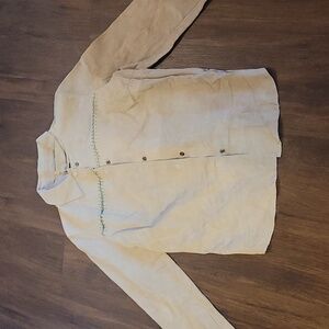 100 % leather with stitching detail. Light tan with light olive stitching